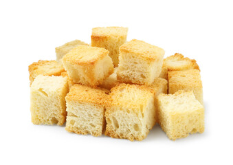Many delicious crispy croutons isolated on white