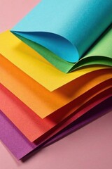Close-up of bifold brochure with colorful papers , texture, fold