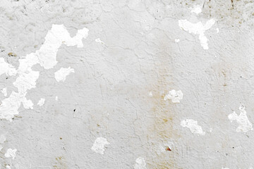 Peeling painted concrete wall. Leaking rain cause the wall and ceiling cracked.