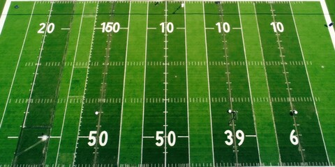 An overhead view of a stunning American football field with bright