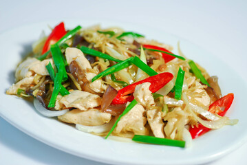 Stir Fried Chicken with Ginger, Stir fried chicken with ginger, chili, onion, and vegetables on a white plate, showcasing vibrant colors and fresh ingredients, Thaifood