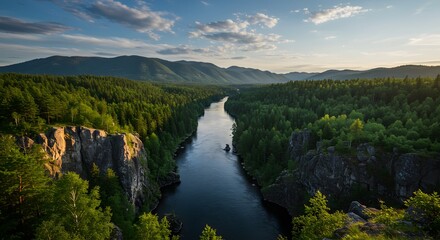 Fototapeta premium Serene River Valley Landscape: Majestic Mountains and Lush Forests
