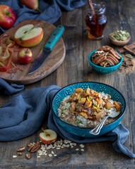Angled View of a Apple Pecan Oatmeal with Honey Syrup