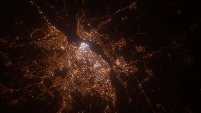 Quebec (Canada) top view at night. Aerial view on modern city from space. Camera is flying above the city, moving forward. Vertical video. The north is on the left side
