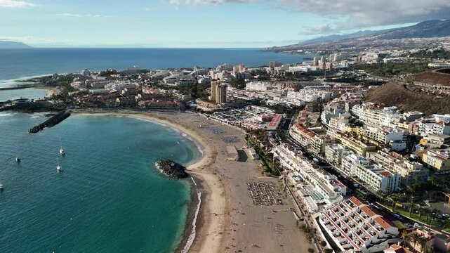  stunning coastline of Los Cristianos in Tenerife with beautiful beaches and vibrant scenery