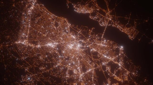 Wilmington (Delaware, USA) top view at night. View on modern city from satellite. Camera is zooming in, rotating counterclockwise. Vertical video. The north is on the left side