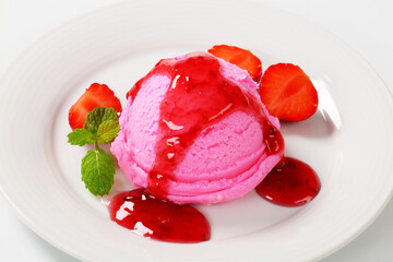 Ice cream with strawberry sauce