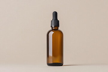 Amber dropper bottle mockup containing essential oil on minimal background