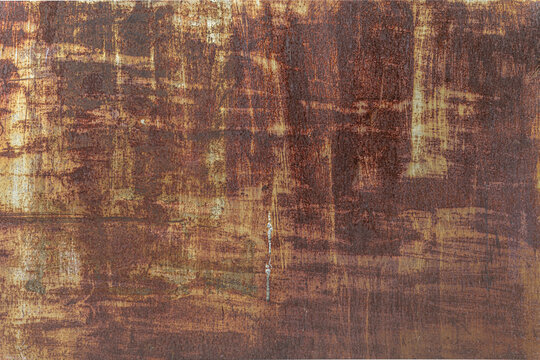 abstract background of an old shubby painted rusty metal surface close up