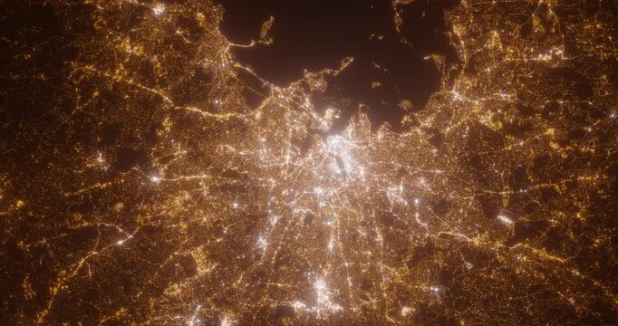 Boston (Massachusetts, USA) top view at night. Aerial view on modern city with lights. Camera is flying above the city, moving backward. Vertical video. The north is on the left side