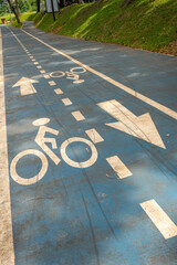 Fototapeta premium Blue road with a white arrow pointing to the right