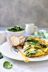 Omelet stuffed with spinach and cheese