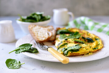 Omelet stuffed with spinach and cheese