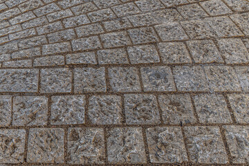 abstract background of stone tiled road in the park