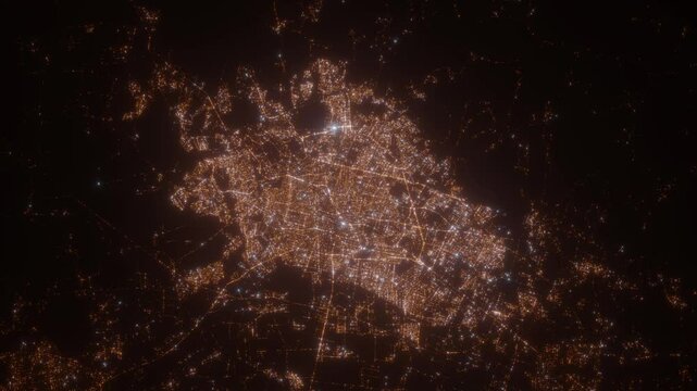 Leon (Mexico) aerial view at night. Top view on modern city with glow effect. Camera is zooming out, rotating counterclockwise