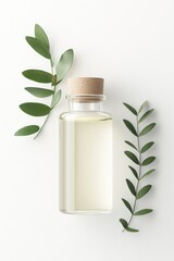 A glass bottle filled with a light oil is elegantly positioned amidst fresh green leaves, creating a serene and natural display perfect for health products