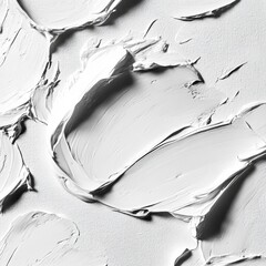 White paint spreading across a smooth white surface creating a subtle and textured artistic impression