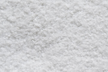 Top view of white fabric used in industrial applications.