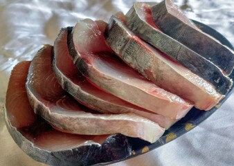 Raw sliced tuna fish background.
