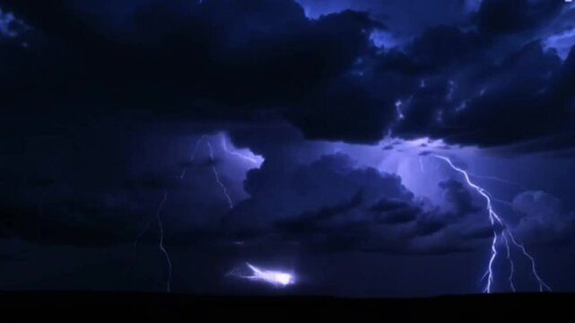 lightening in the sky at stormy night