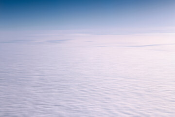 Serene Above the Clouds An Expansive and Stunning Aerial View Showcasing Soft, Fluffy White Cloud Cover