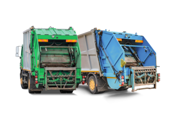 Two garbage trucks, green and blue, parked next to each other. Separate waste collection concept in the city.