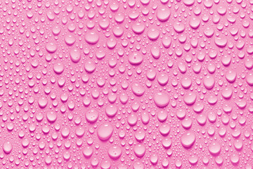 Cosmetic moisturizing liquid drops on red background. Toner or lotion. Hydrator serum. Skin care beauty product