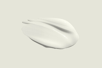 Face or body white balm milk emulsion cream hair balm light grey colored background 