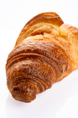 Delicious snack croissant on white background