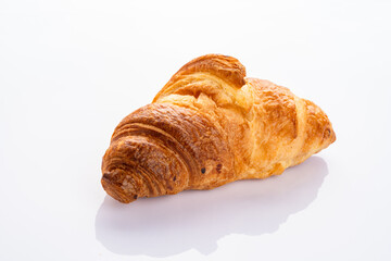 Delicious snack croissant on white background