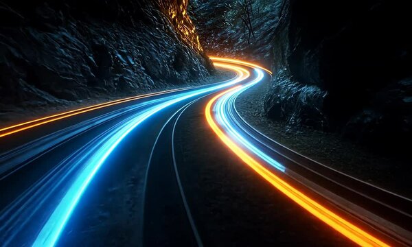 Abstract light trails on a winding mountain road at night visual concept