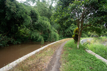 Footpath along the river. The small road is still dirt