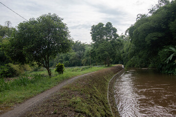 Footpath along the river. The small road is still dirt