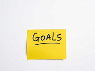 Goals message on sticky post-it note on white background, business planning