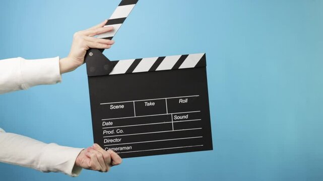Movie slate being clapped, studio production, start of a new scene in a Hollywood film