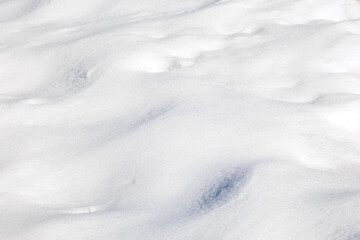 Obraz premium Snow texture with icy surface and blue shadows, Tyrol, Austria, March 19, 2025
