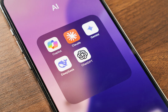 Poznan, Poland - March 12, 2025: smartphone screen with top ai assistant apps including copilot, claude, gemini, deepseek and chatgpt
