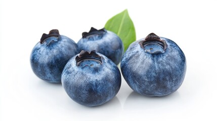 Obraz premium Fresh ripe blueberries isolated on white background, showcasing their vibrant blue color, natural texture, and plump appearance. Ideal for food, health, and nutrition concepts.
