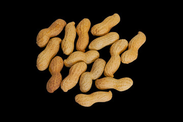 High angle close-up view of peanuts against black background. Photo taken March 23rd, 2025, Zurich, Switzerland.