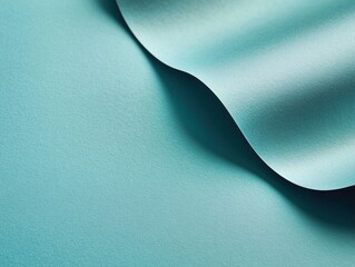 Teal paper texture with flowing curves, perfect for stationery design.