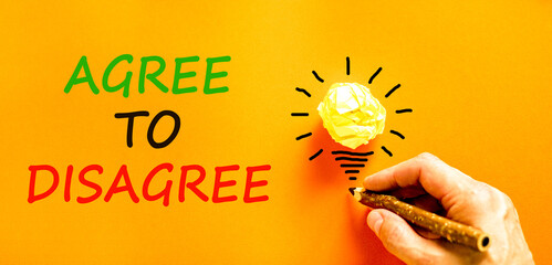 Agree to disagree symbol. Concept words Agree to disagree on beautiful orange paper. Beautiful...