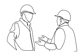 Two Engineers in Hard Hats Discuss Project Plans