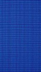 Rough, uneven woven cotton surface; deep indigo blue, distinct twill weave, woven fabric, material texture, textile background