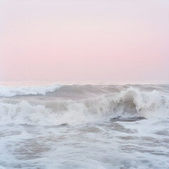 Fototapeta premium Eternal Dance of Ocean Waves Under a Serene Pastel Sky Capturing Nature's Rhythmic Beauty
