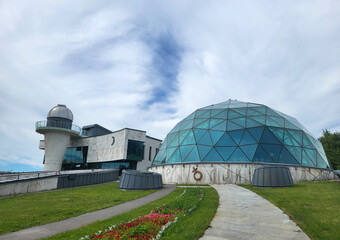 Russia Yaroslavl 07 14 2023 Yaroslavl Cosmonaut Valentina Tereshkova Planetarium against a cloudy sky.
