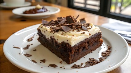 Plate with a slice of tasty homemade chocolate cake, placed on the table, showcasing its rich texture and delicious appearance."