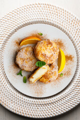 Delicious Spanish dessert LECHE FRITA traditional to prepare for the Easter holiday. Top view table.