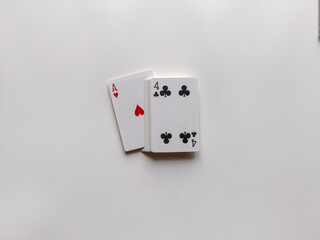 Playing Cards on White Background, Ace of Hearts, Four of Clubs