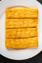 Fish sticks seafood dish fresh delicious gourmet food background on table rustic food top view copy space keto and paleo pescetarian diet
