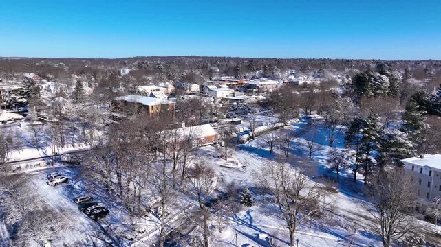Historic residential houses aerial view in winter including Post Ofiice in historic town center of Wellesley, Massachusetts MA, USA.